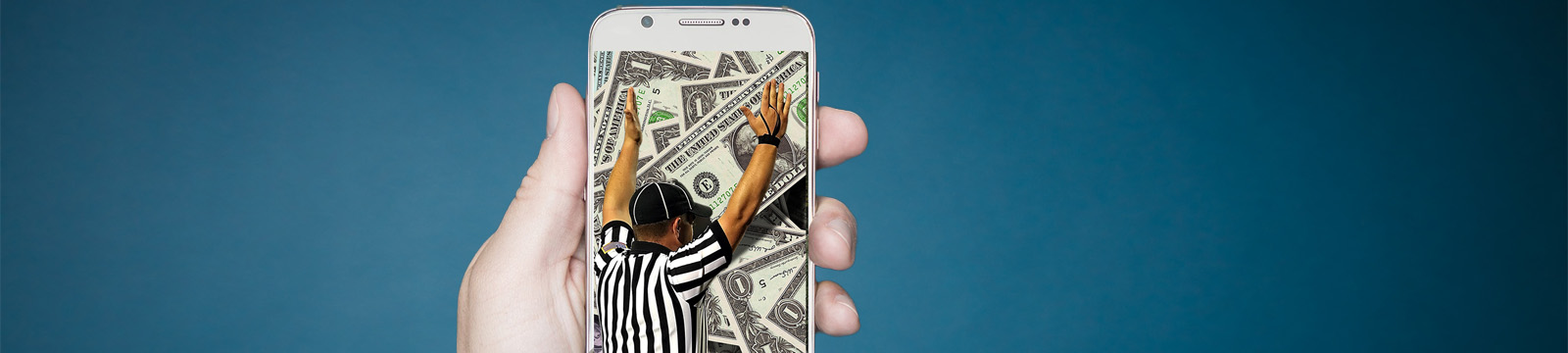Graphic of a hand holding a smart phone with the image of a referee signaling a touchdown and dollar bills in the background.