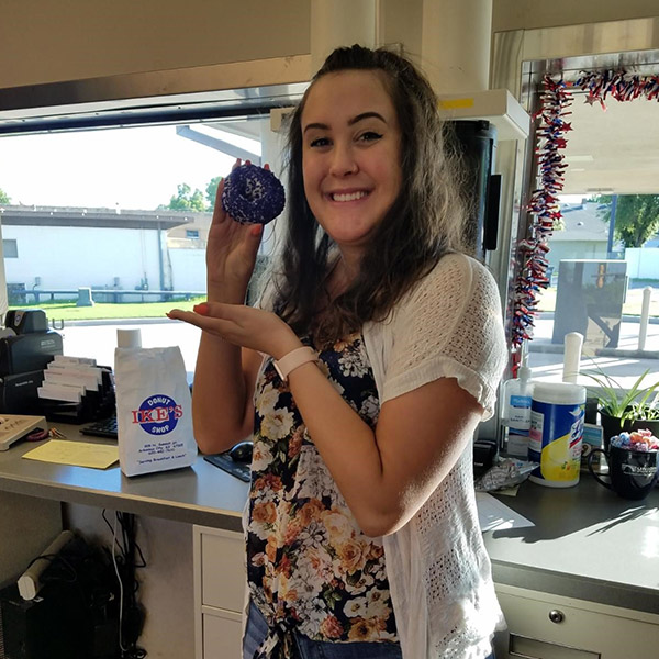 USB staff enjoying National Donut Day.