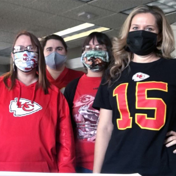 The USB team wearing their Kansas City Chiefs gear in support of the football team's Super Bowl appearance.