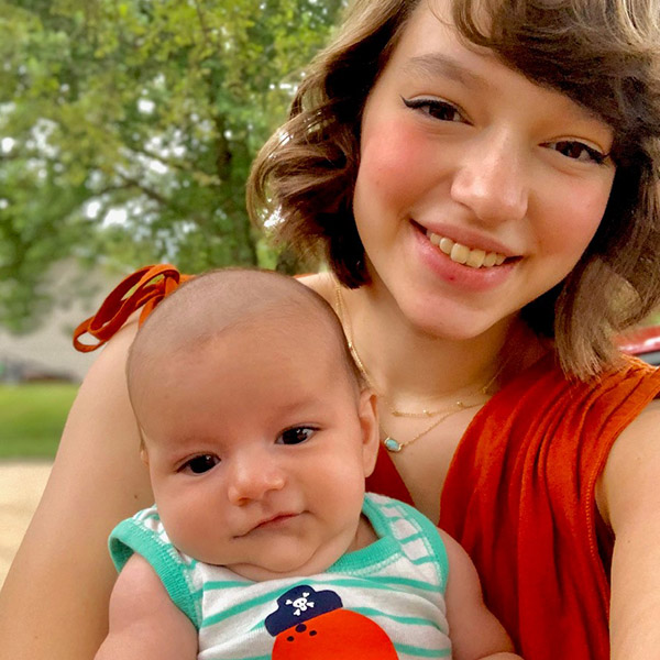 Selfie Day photo of USB team member and her son.