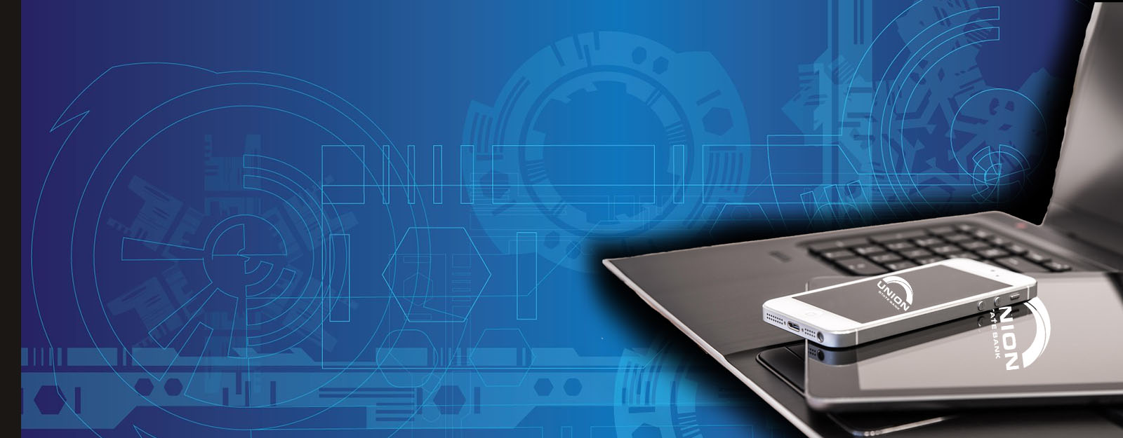 Image of a laptop, tablet and smart phone stacked.