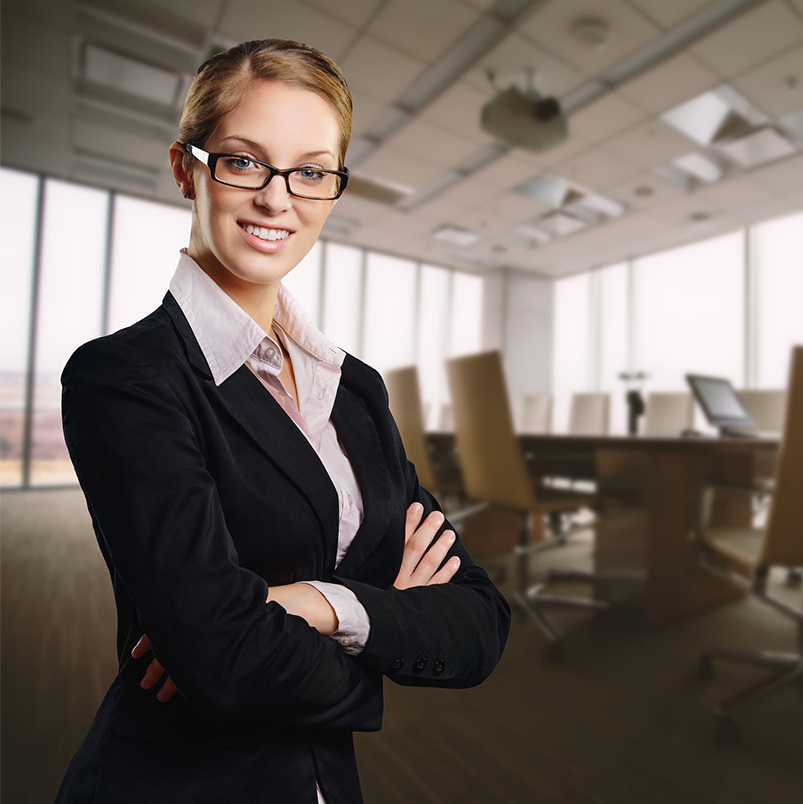 Photo of woman in business attire standing in conference room. Union State Bank Treasury Services.