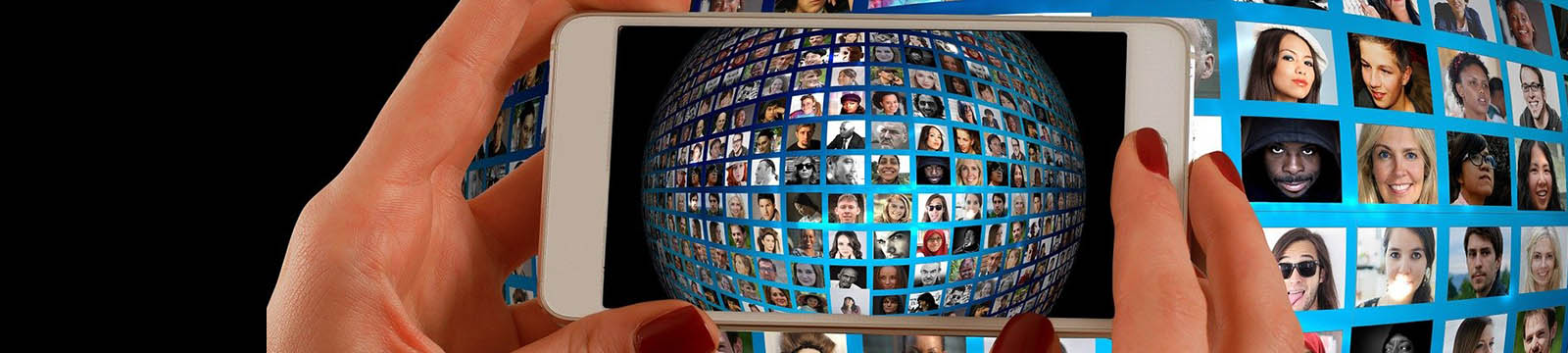 Photo of a smartphone being used to take a photo of a globe made of individual photos.