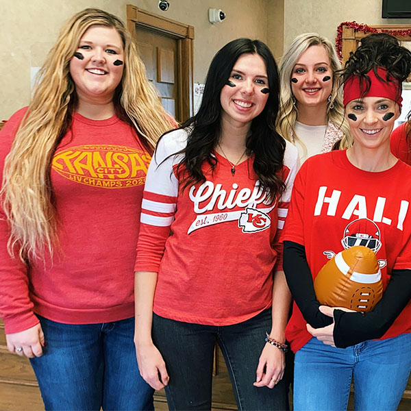 The USB team wearing their Kansas City Chiefs gear in support of the football team's Super Bowl appearance.